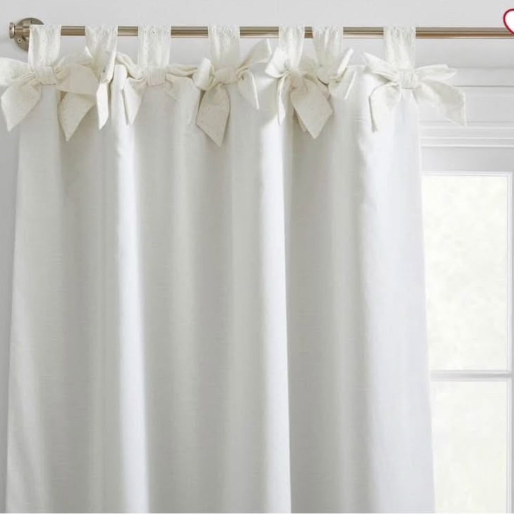 Elegant White Curtain with Bow Accents